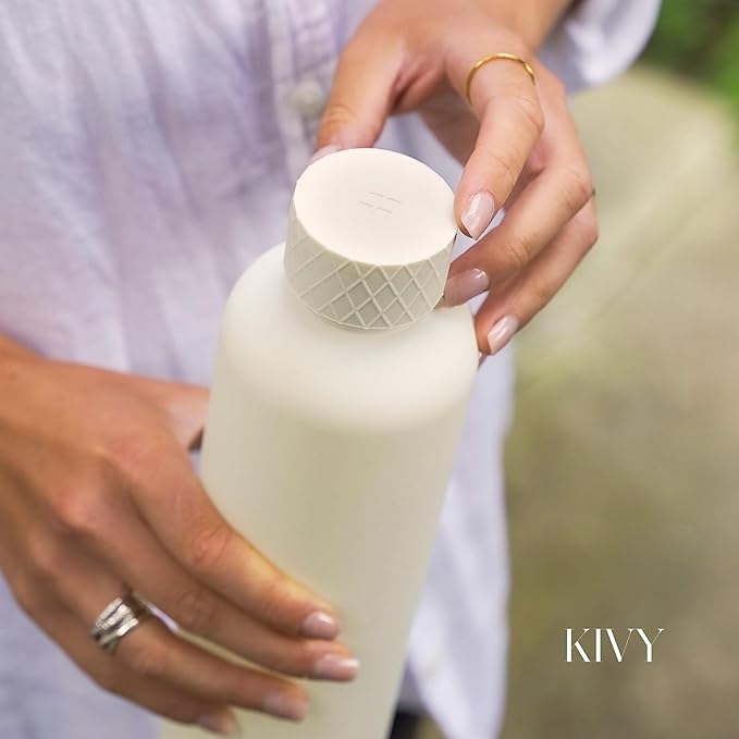 KIVY Large Water Bottle 50oz [Lightweight & Shatterproof] - Fits Backpack & Cupholder for Travel, Sports, School - Clear, No Straw, 1.5 Liter
